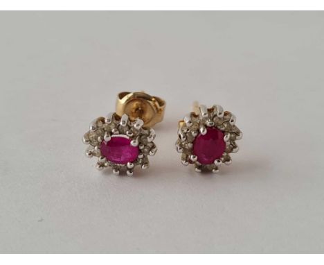 Pair of ruby &amp; diamond 9ct studs