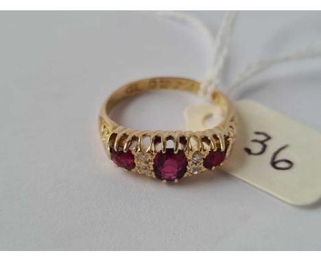 A EDWARDIAN GOLD RUBY AND DIAMOND SEVEN STONE RING CHESTER 1907 18CT GOLD SIZE L