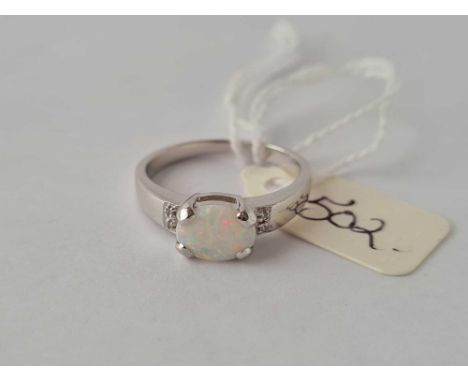 An opal and diamond 9ct gold ring size O 2.9g inc