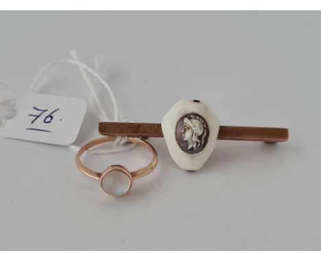 An unusual 9ct bar brooch with Cowrie shell Intaglio and a 9ct moonstone ring