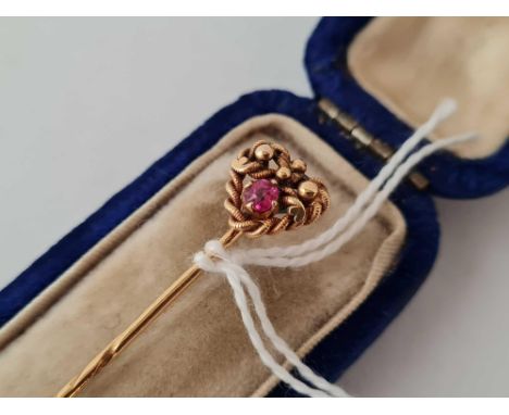 An attractive ruby heart rope twist stick pin in antique box 1.7g inc