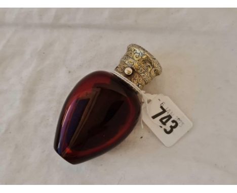 A good quality scent bottle with Ruby glass body and engraved neck and hinged cover, stamped MARSHALL