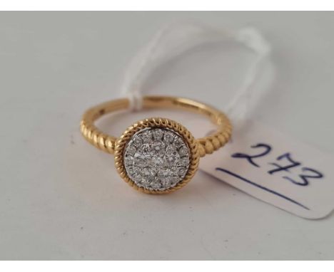 An attractive diamond ring with rope twist detail to shank in 18ct gold size M 3.5g inc