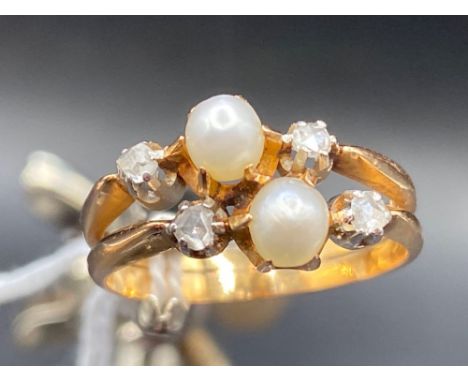 A EDWARDIAN REAL PEARL AND DIAMOND TWO ROW RING IN HIGH CARAT GOLD TESTED