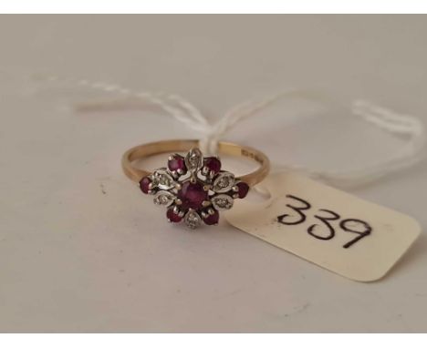 A fancy ruby and diamond 9ct cluster ring size K 1.4g inc