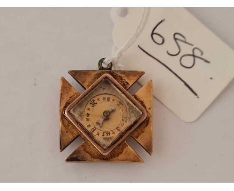 A gilt compass fob in the form of a Maltese cross