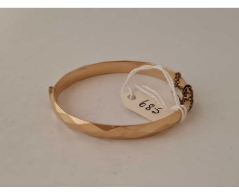 A rolled gold bangle