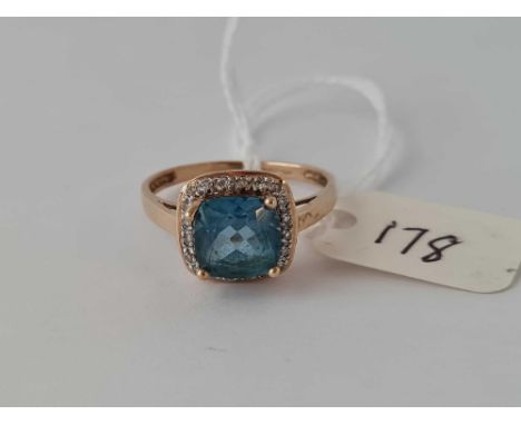 A white gold topaz and diamond halo ring 9ct size Q    2.6 gms