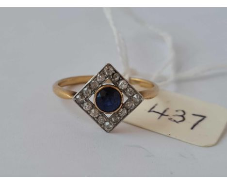 A deco sapphire and diamond cluster ring with central sapphire set in high carat gold size N     2 gms
