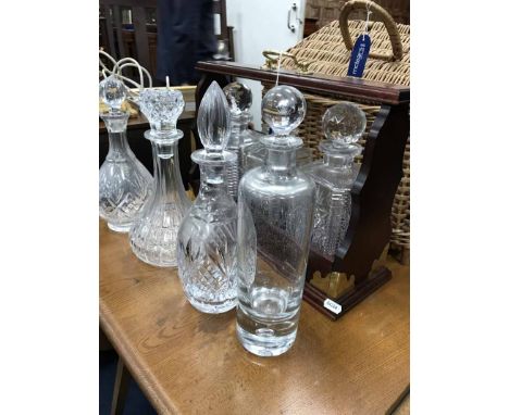 THREE DECANTER TANTALUSwith four other glass decanters