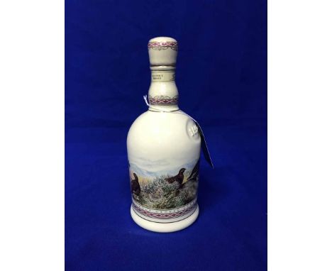 FAMOUS GROUSE CENTENARY DECANTER 1896-1996Blended Scotch Whisky.70cl, 40% volume, in Wade porcelain decanter   CONDITION REPO