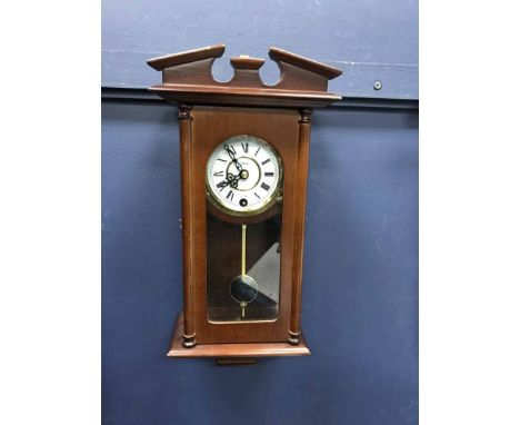 REPRODUCTION WALL CLOCK AND AN OVAL WALL MIRROR