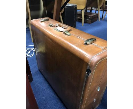 COLLECTION OF LINEN IN VINTAGE SUITCASE