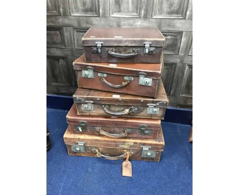 GROUP OF VINTAGE LEATHER SUITCASESof varying sizes
