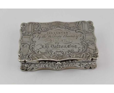 EDWARD SMITH A MID VICTORIAN SILVER SNUFF BOX, the hinged lid with presentation inscription, all over chased foliate decorati