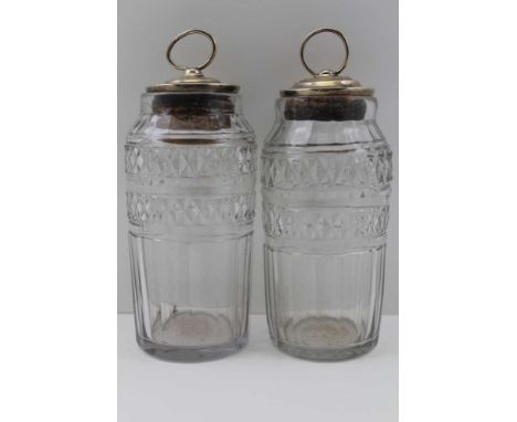 A PAIR OF 18TH CENTURY IRISH CUT GLASS JARS, hobnail bands over facets, ground pontils, fitted silver covers with corks and r