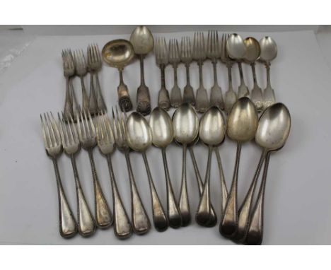 A COLLECTION OF SHELL DESIGN EPNS FLATWARE including serving spoon, 3 table forks, 3 dessert forks, 3 dessert spoons , a ladl