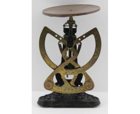 A 'COLUMBUS' EARLY 20TH CENTURY BILATERAL BRASS &amp; CAST IRON POSTAL SCALE, 20cm high 