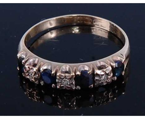A 9ct gold, sapphire and diamond point set half hoop ring, 2.2g, size R