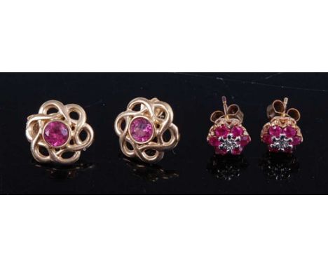 A pair of yellow metal and pink sapphire set flower head ear studs, dia.12mm; together with a pair of ruby and diamond point 