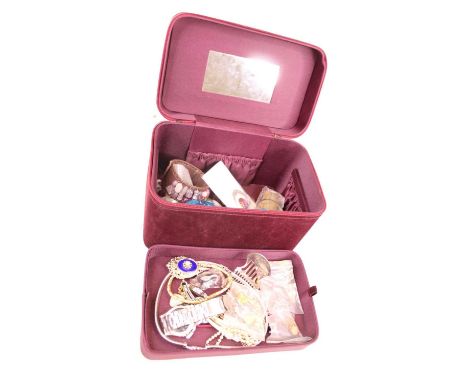 A box of miscellaneous costume jewellery, to include hand mirror, leather stud box, various beaded necklaces, jewellery box e