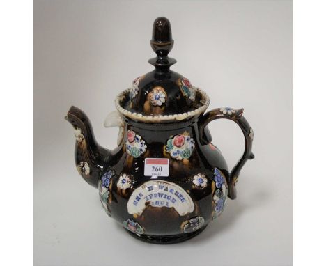 A Victorian barge ware teapot inscribed "Mrs H Warren, Ipswich 1881" height 30cm