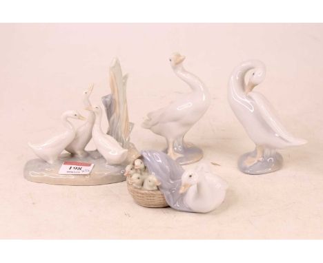 A Lladro Spanish porcelain model of geese with goslings in basket, having printed mark verso; together with two other Lladro 