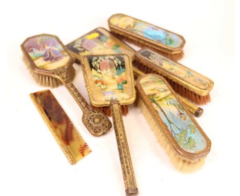 A collection of ladies dressing table wares to include hand brushes, hair brushes, comb etc, each having celluloid back with 