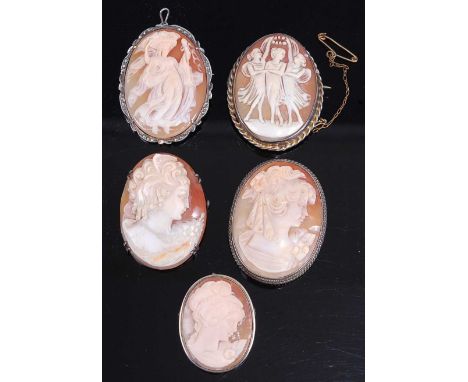 A white metal mounted carved shell cameo profile portrait brooch of a maiden, 4x3cm, together with four others to include The