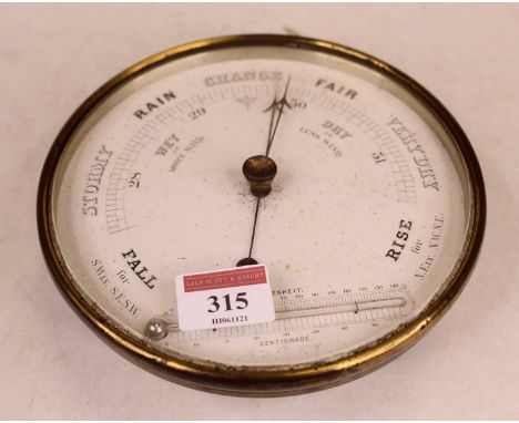 An early 20th century brass cased barometer, having circular dial with mercury scale (lacking mercury), dia.17cm