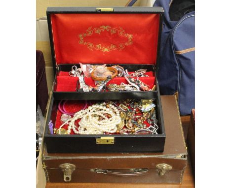 A leather clad jewellery box and contents, to include various lady's wristwatches, faux pearl choker, earrings etc; together 