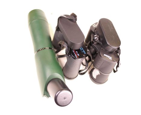 A pair of Viking 10x50 field binoculars, in canvas pouch; together with a pair of Swift Grand Prix Mk1 8x40 binoculars; a Clu