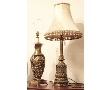 A modern brass table lamp, of pierced baluster form, h.53cm; together with one other brass column lamp, with pleated shade (2