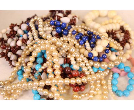 A collection of miscellaneous costume jewellery, to include various beaded necklaces, faux pearl necklace etc 