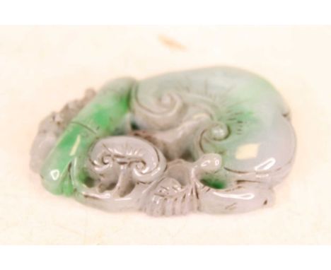 A reproduction Chinese style faux jade carving