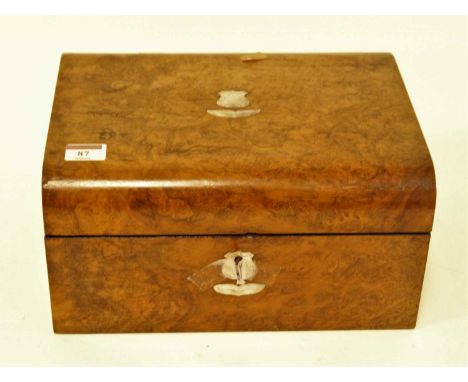 A Victorian walnut and mother of pearl inlaid writing slope, the hinged domed top opening to reveal a fitted interior, w.30cm
