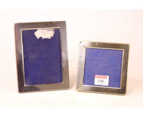 A modern sterling silver clad easel photograph frame, of plain undecorated rectangular form, 15.5 x 11.5cm; together with one