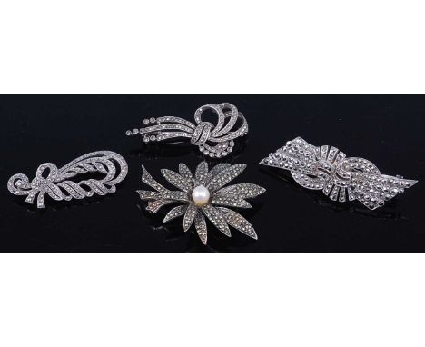 Marcasite and white metal costume jewellery comprising a cultured pearl palm leaf brooch, together with three other brooches 