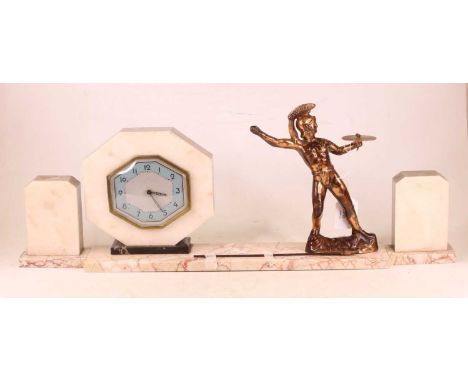 An Art Deco marble cased clock garniture, the central clock of octagonal form, with engine turned dial and Arabic numerals, s