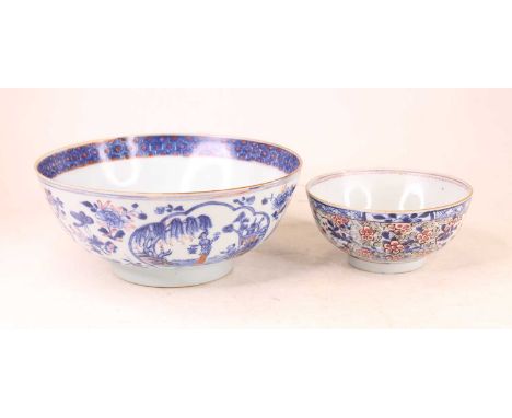 A Chinese export bowl, painted with figures beside a tree and pagoda in the background, having further floral decoration, dia