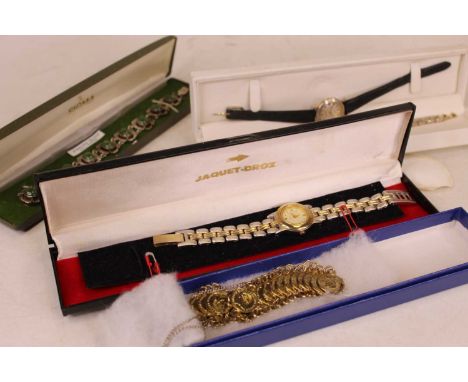 A lady's silver bracelet, inset with nine jade cabochons, boxed; together with three lady's quartz wristwatches; and a faux c
