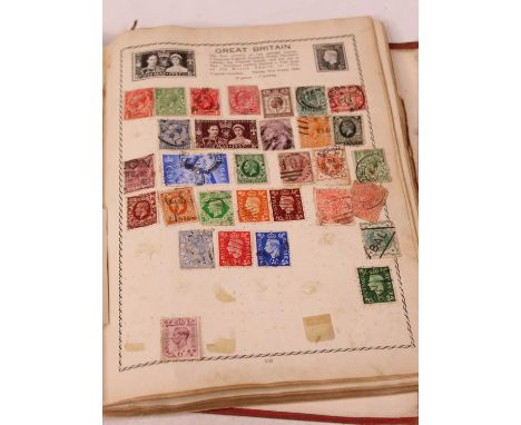 A box of miscellaneous items, to include a schoolboy stamp album, cigarette cards, and a pair of mother of pearl and brass op