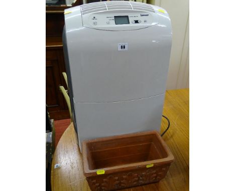 An Igenix dehumidifier &amp; a rectangular pottery planter E/T