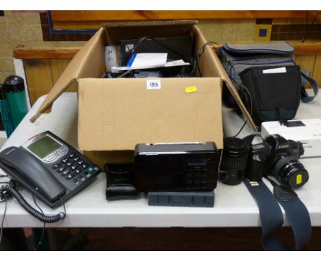 A good parcel of camera equipment including Canon camera, lenses, camera bags, also home telephones etc
