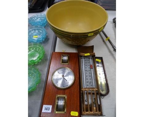 A Williams-Sonoma Christmas themed mixing bowl, vintage barometer and thermometers