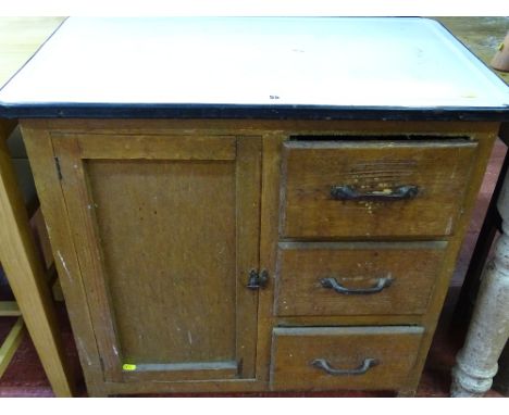 A vintage pine kitchen cupboard base with white enamel top