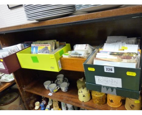A quantity of vintage and collector's postcards and cards in several boxes etc