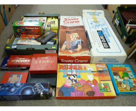 A boxed metal detector, a boxed Casdon tower crane, a quantity of vintage &amp; other table &amp; board games with a small co