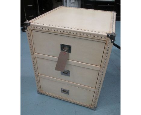 LEATHER SIDE TRUNK, in cream with three drawers, 57cm W x 62cm D x 72cm H.