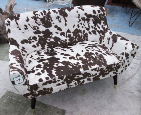 SOFA, of small proportions, in faux cowhide, on turned supports, 120cm L.